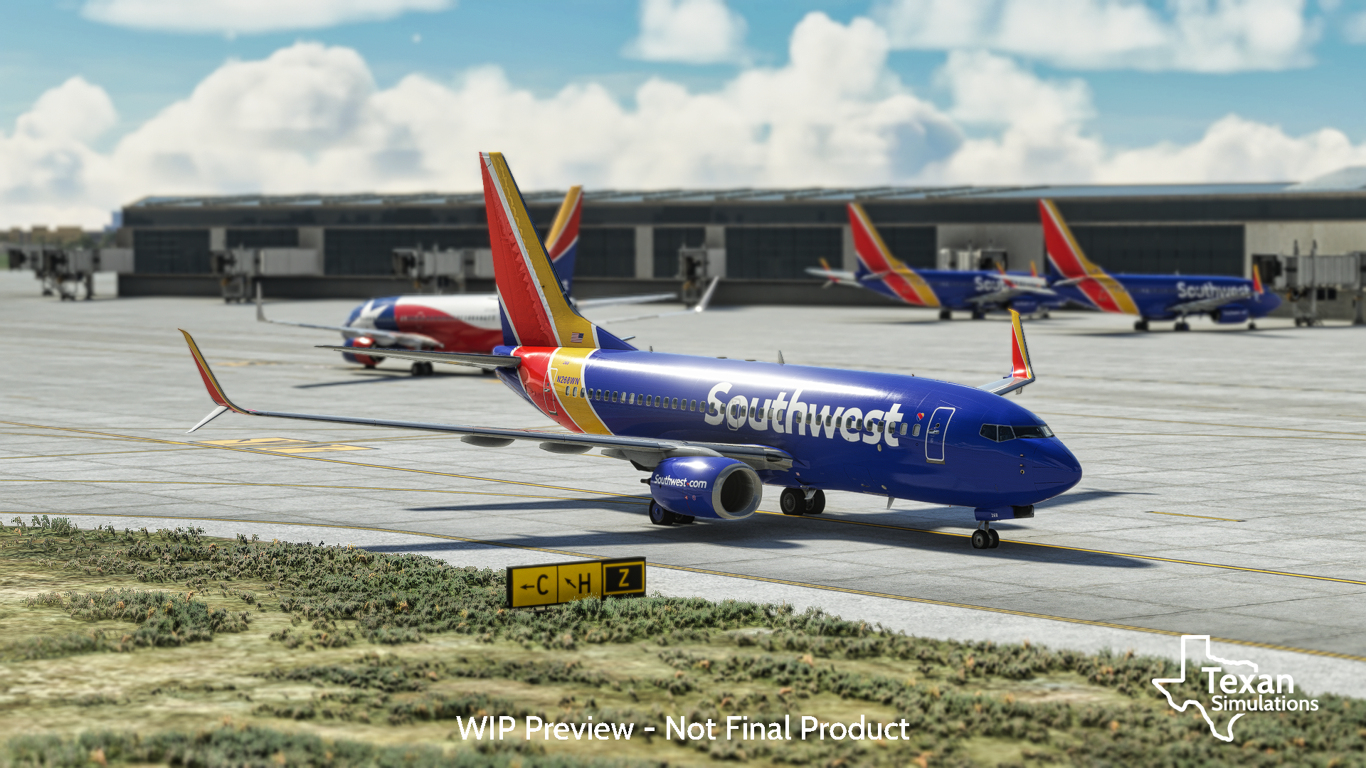 An airplane on an apron, with a taxi way information sign on top of it. There are more airplanes and the terminal in the background.